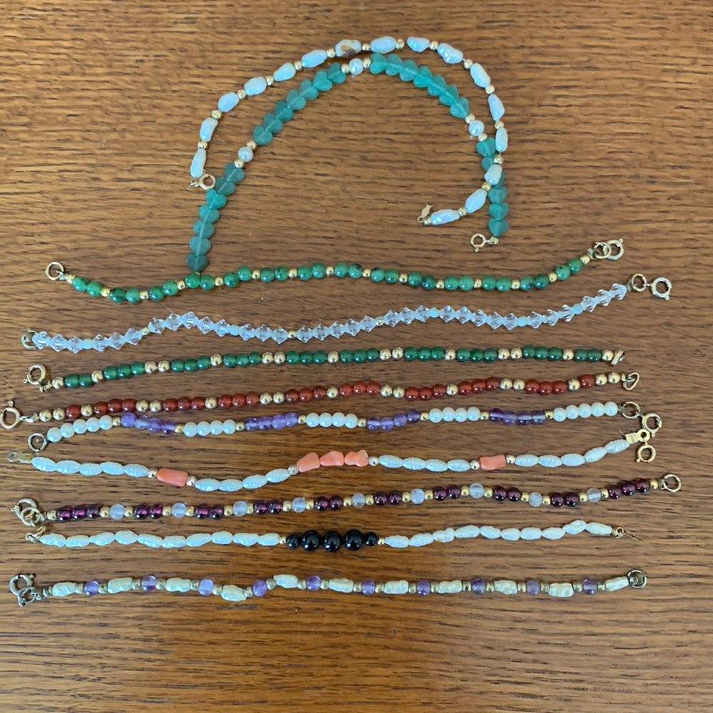 11 costume bracelets,pre worn but like new